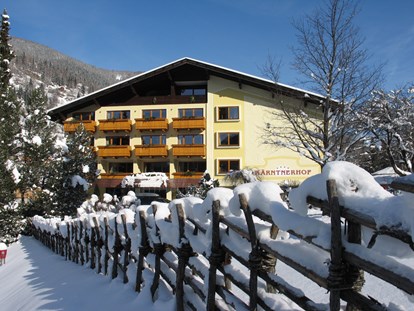 Familienhotel - Skikurs direkt beim Hotel - Kärnten - Winteransicht KAHO - Familien- & Sporthotel Kärntnerhof