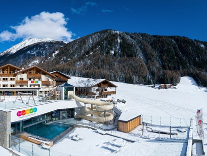 Familienhotel - Ponyreiten - Südtirol - Winter Außenaufnahme - Familienhotel Huber