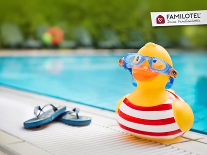 Familienhotel - Kinderbetreuung in Altersgruppen - Deutschland - Schwimmbad - Außenbecken - Hotel Sonnenhügel Familotel Rhön