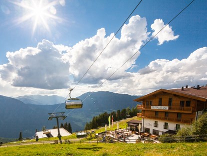 Familienhotel - Verpflegung: All-inclusive - Tirol - Unsere SAILI ALM im Sommer - auch im Sommer gibt's den Mittagssnack hier oben - direkt im Ski- bzw. Wandergebiet - Kinderhotel STEFAN****