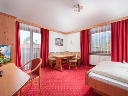 Familienhotel - Garten - Tirol - Straußennest - Elternzimmer - 2 Raum App. 2 Erw. bis zu 5 Kinder - Familienhotel Central 