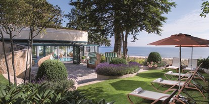 Familienhotel - Umgebungsschwerpunkt: Meer - Ostsee - Liegewiese mit Blick zur Ostsee - Travel Charme Strandhotel Bansin