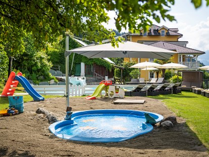 Familienhotel - Pools: Schwimmteich - Österreich - Beheiztes Kinderbecken - Familienhotel Post am Millstätter See - family.sport | see.berg