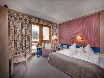 Familienhotel - Wellnessbereich - Kärnten - Zweites Schlafzimmer in der Familien-Luxussuite "Max & Moritz" - Hotel St. Oswald