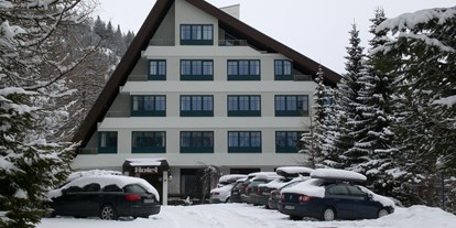 Familienhotel - Verpflegung: alkoholfreie Getränke ganztags inklusive - Kärnten - Das Hotel Nockalm im Winter - Nockalm