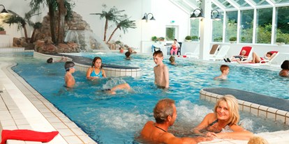 Familienhotel - Pools: Innenpool - Harz - Schwimmbad-Landschaft - Panoramic Hotel - Ihr Familien-Apartmenthotel