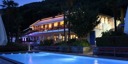 Familienhotel - Suiten mit extra Kinderzimmer - Schweiz - Restaurant bei Nacht - Top Familienhotel La Campagnola