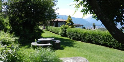 Familienhotel - Suiten mit extra Kinderzimmer - Schweiz - Garten - Top Familienhotel La Campagnola