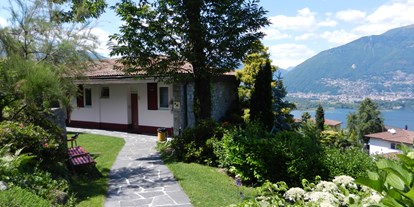Familienhotel - Suiten mit extra Kinderzimmer - Schweiz - Garten  - Top Familienhotel La Campagnola