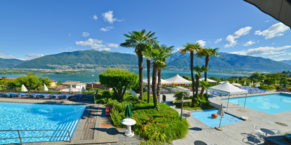 Familienhotel - Umgebungsschwerpunkt: am Land - Schweiz - Schwimmbadterrasse - Top Familienhotel La Campagnola