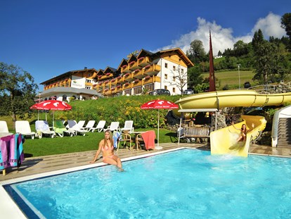 Familienhotel - Mallnitz - Außenpool mit Wasserrutsche: https://www.glocknerhof.at/hotel-mit-pool-und-wasserrutsche-in-kaernten.html - Hotel Glocknerhof