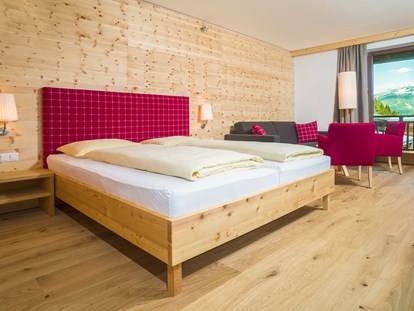 Familienhotel - Wellnessbereich - Kärnten - Zimmer mit Doppelbett - Familienhotel Kreuzwirt