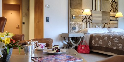 Familienhotel - Suiten mit extra Kinderzimmer - Schweiz - Grandlit Zimmer - Tschuggen Grand Hotel