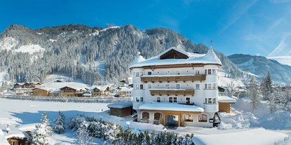 Familienhotel - Ausritte mit Pferden - Salzburg - Winterurlaub im Hotel Bergzeit  - Hotel Bergzeit - Urlaub al dente