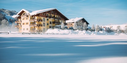 Familienhotel - Ausritte mit Pferden - Salzburg - Winterurlaub in Österreich für die ganze Familie - Hotel Gut Weissenhof ****S