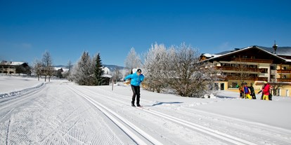 Familienhotel - Skilift - Direkter Einstieg vorm Haus in die 180 km lange Langlaufloipe - Hotel Gut Weissenhof ****S