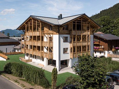 Familienhotel - Umgebungsschwerpunkt: Fluss - Bad Gastein - Außenansicht der Familienlodge Emmy Sommer - Familienresort Reslwirt