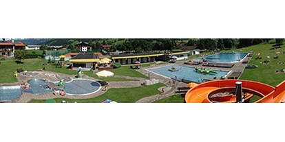 Familienhotel - Spielplatz - Unken - öffentliches Freischwimmbad von Oberndorf "Bichlachbad" - Kaiserhotel Kitzbühler Alpen
