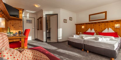 Familienhotel - Einzelzimmer mit Kinderbett - Kitzbühel - Wohnbeispiel 2 - MY ALPENWELT Resort****SUPERIOR