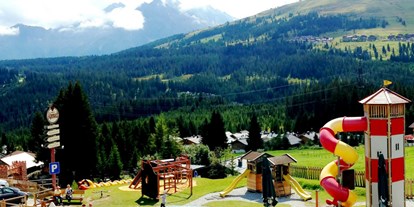 Familienhotel - Pools: Schwimmteich - Österreich - Spielplatz - MY ALPENWELT Resort****SUPERIOR