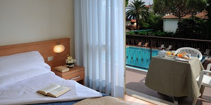 Familienhotel - Umgebungsschwerpunkt: Strand - Italien - Standard-zimmer
Die Standardzimmer sind perfekt für Gäste, die eine einfache, funktionale, aber auch preiswerte Unterbringung suchen, jedoch mit dem richtigen Service und Komfort. - Hotel Raffy