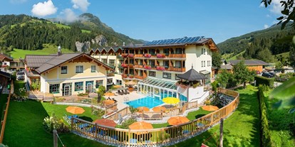 Familienhotel - Suiten mit extra Kinderzimmer - Obertauern - Hotelansicht - Hotel Guggenberger