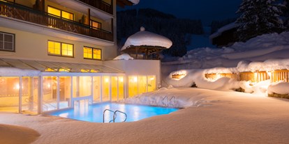 Familienhotel - Einzelzimmer mit Kinderbett - Gröbming - Winter Poolbereich - Hotel Guggenberger
