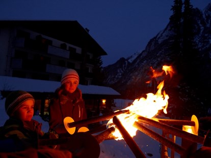 Familienhotel - Skikurs direkt beim Hotel - Davos Platz - Fackelwanderung - Familienhotel Lagant