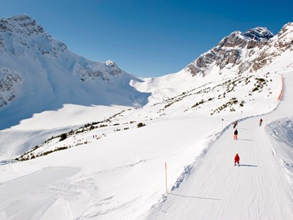 Familienhotel - Skikurs direkt beim Hotel - Davos Platz - Erleben Sie traumhafte Skitage mit der ganzen Familie - Familienhotel Lagant