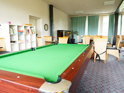 Familienhotel - Suiten mit extra Kinderzimmer - Wismar - Aufenthaltsraum und Spielzimmer - Familienhotel am Tierpark