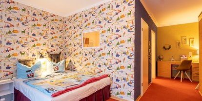 Familienhotel - Umgebungsschwerpunkt: Strand - Kinder und Babyzimmer "Kinderreich" - Familotel Borchard's Rookhus