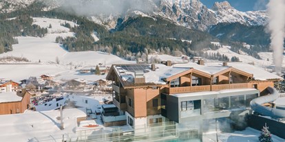 Familienhotel - Garten - Pinzgau - Good Life Resort die Riederalm 
im Winter - Good Life Resort die Riederalm ****S