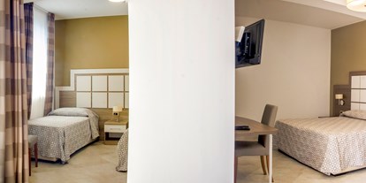 Familienhotel - Einzelzimmer mit Kinderbett - Italien - Junior Suite Zimmer - SAN DOMENICO FAMILY HOTEL