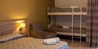Familienhotel - Kinderbetreuung in Altersgruppen - Italien - Vierbettzeimmer - SAN DOMENICO FAMILY HOTEL