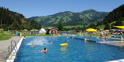 Familienhotel - Kinderbetreuung - Tiroler Unterland - Badesee - Das Hopfgarten Familotel Tirol