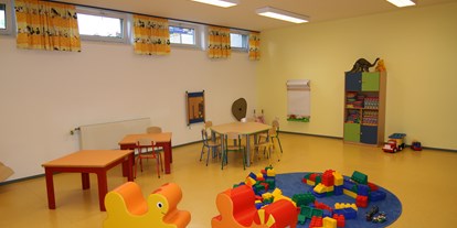 Familienhotel - Einzelzimmer mit Kinderbett - Altenmarkt im Pongau - Kinderspielraum innen - Hotel-Restaurant Grimmingblick