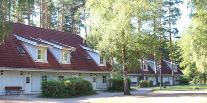 Familienhotel - Wesenberg (Mecklenburgische Seenplatte) - Ferienhäuser im Groß Väter See - martas Gästehäuser Groß Väter See
