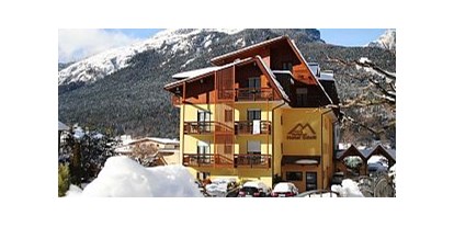 Familienhotel - Kinderwagenverleih - Trentino - Winterliche Landschaft ums Haus - Residence Hotel Eden - Family & Wellnes Resort