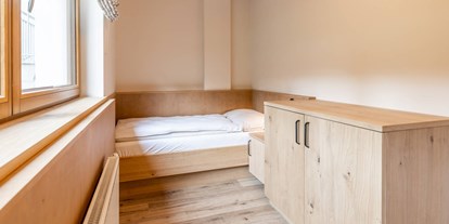Familienhotel - Suiten mit extra Kinderzimmer - Bayern - Kinderzimmer Studio Kitzlahner - Das Bayrischzell Familotel Oberbayern