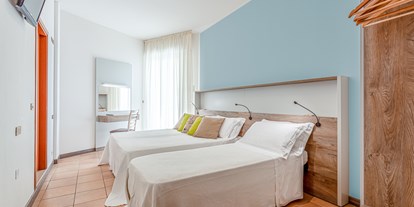 Familienhotel - Pools: Außenpool nicht beheizt - Cesenatico-Villamarina - Inside Room - Hotel Roxy & Beach