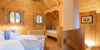 Familienhotel - Sauna - Faak am See - Troadkasten Schlafzimmer - Almdorf Seinerzeit
