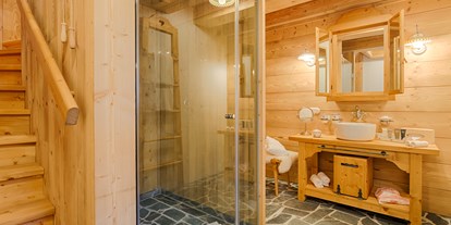 Familienhotel - Sauna - Faak am See - Troadkasten Badezimmer - Almdorf Seinerzeit