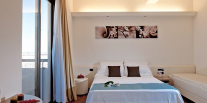 Familienhotel - Suiten mit extra Kinderzimmer - Pesaro - das Zimmer Re Leone - Das Hotel des Bären Bo