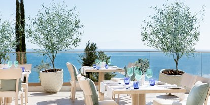 Familienhotel - Pools: Infinity Pool - Elia Beach - Fresco Restaurant - Eines der vier A La Carte Restaurant - Ikos Resort Oceania