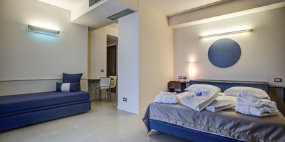Familienhotel - Umgebungsschwerpunkt: Strand - Emilia Romagna - Das Zimmer von 26 Q.M. - Blu Suite Hotel