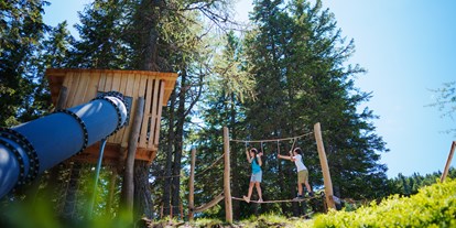 Familienhotel - Pools: Infinity Pool - Faak am See - Erlebnispark für alle Generationen - Mountain Resort Feuerberg