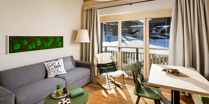 Familienhotel - Verpflegung: Halbpension - Graubünden - Duplex Familienzimmer | Wohnbereich - Hotel Sport Klosters