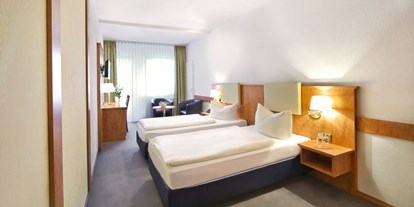 Familienhotel - Umgebungsschwerpunkt: am Land - Deutschland - Zimmerbeispiel Doppelzimmer Standard plus - Waldhotel Bächlein