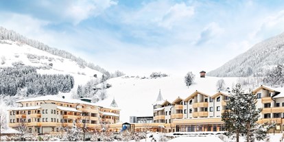 Familienhotel - Pools: Schwimmteich - Osttirol - Die Dolomiten Residenz im Winter - Dolomiten Residenz****s Sporthotel Sillian