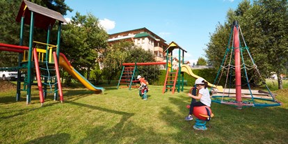 Familienhotel - Preisniveau: exklusiv - Rasen Antholz (BZ) - Spielplatz beim Hotel - Dolomiten Residenz****s Sporthotel Sillian